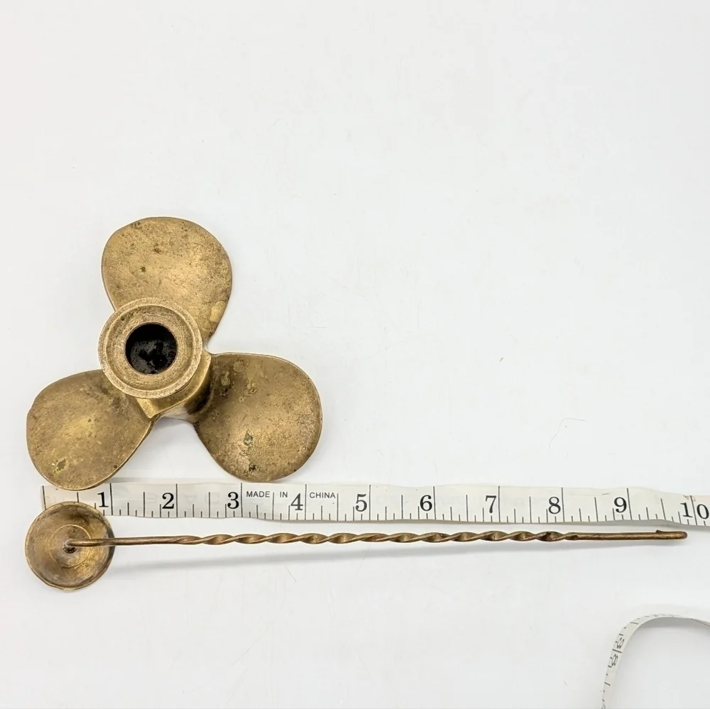 Vintage brass propeller candle holder and snuffer